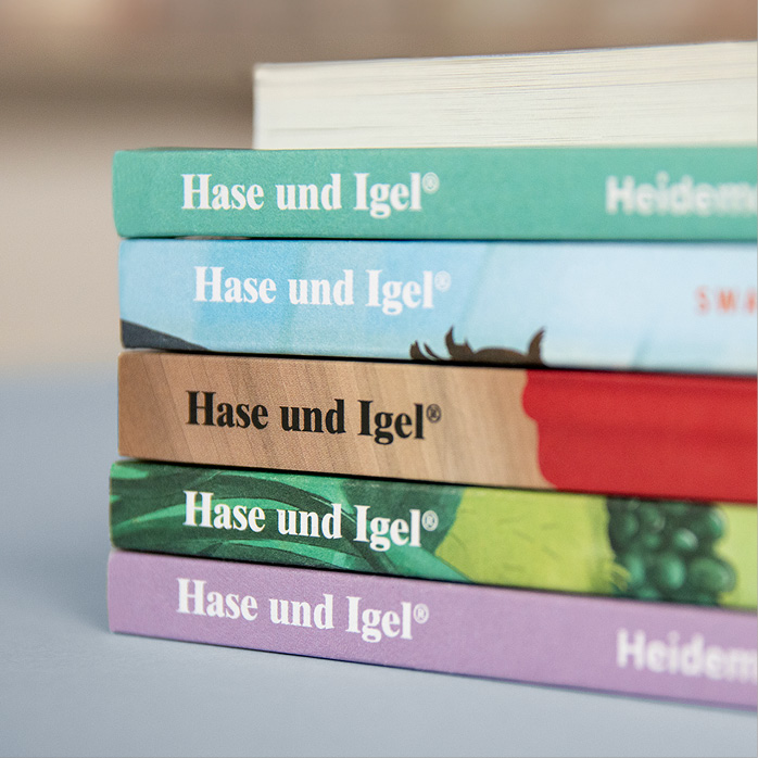 Fünf Buchrücken von Titeln aus dem Hase und Igel Verlag